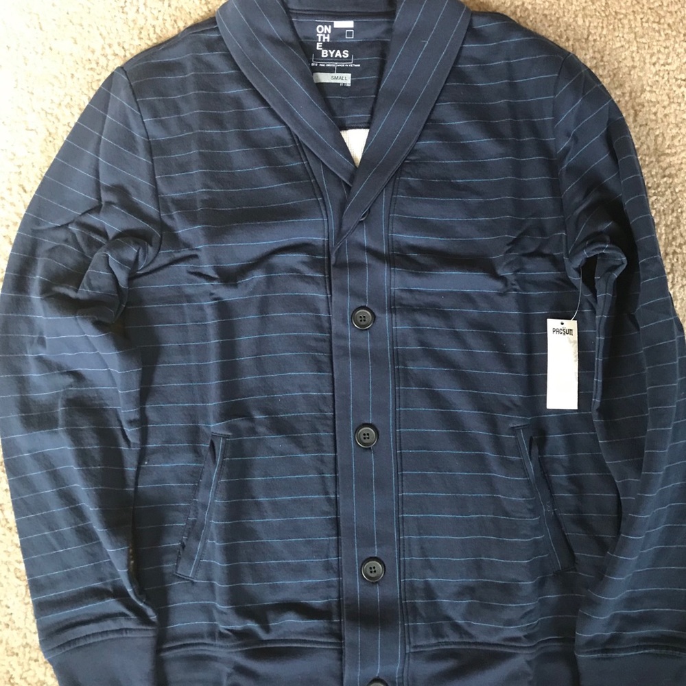 On the BYAS button sweater. Small / Blue
